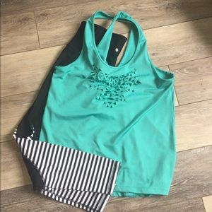 Pink Lotus Movement tank w/ cutout design, medium